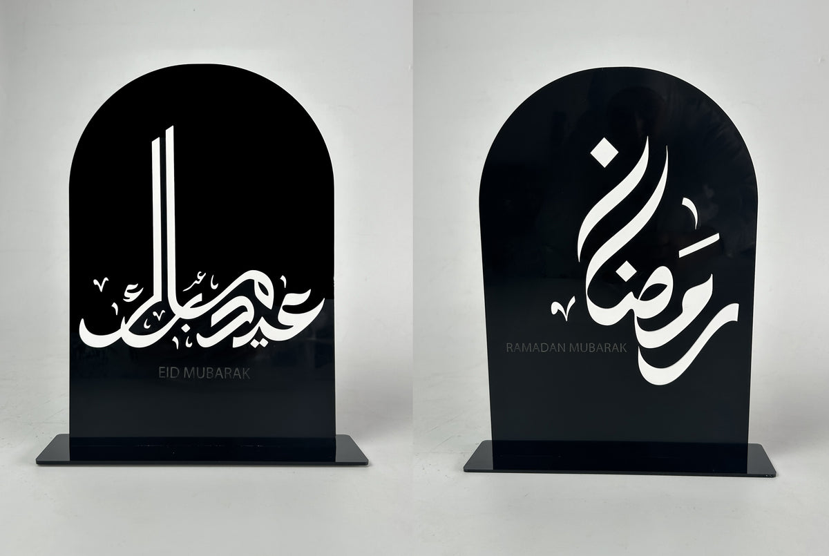 قوسان أسودان، أحدهما «عيد سعيد» والآخر «رمضان»