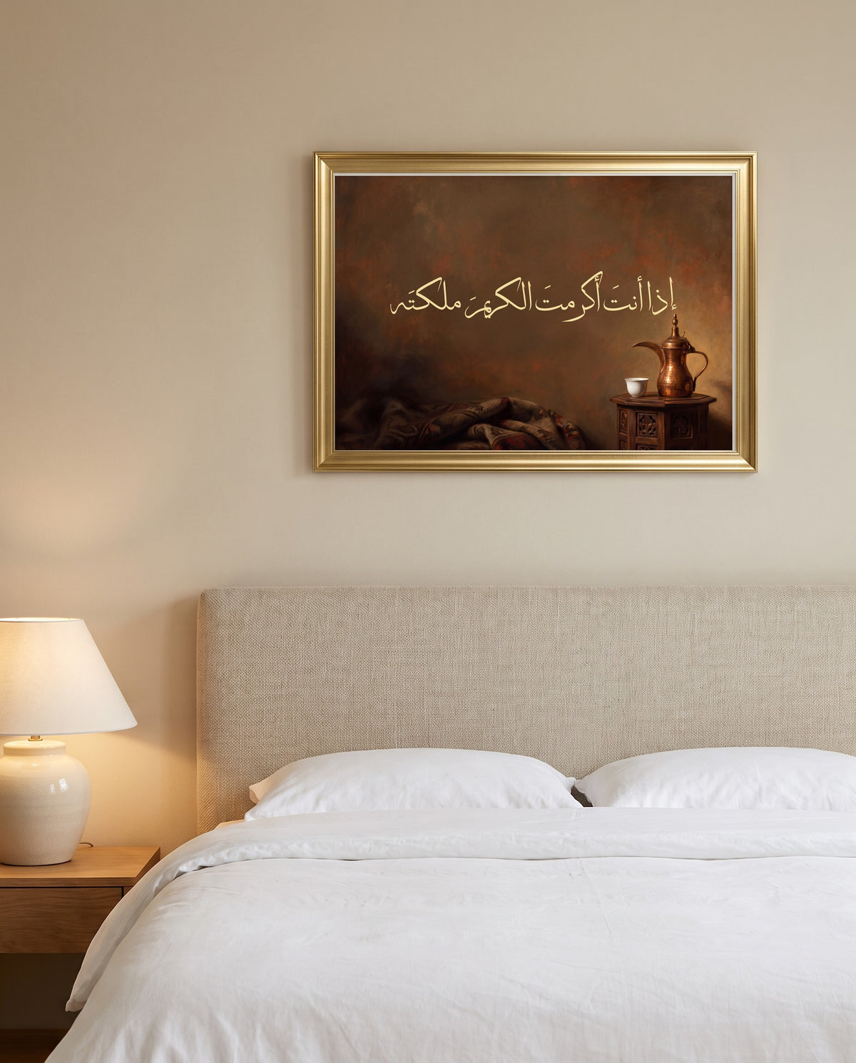 Honour the Noble and You Win Him: Arabic poetry in Thuluth calligraphy, framed in polished gold above a bed with white linen