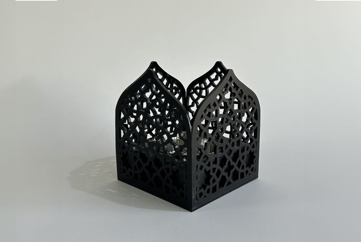 Black pierced arabesque censer with a crown-shaped top